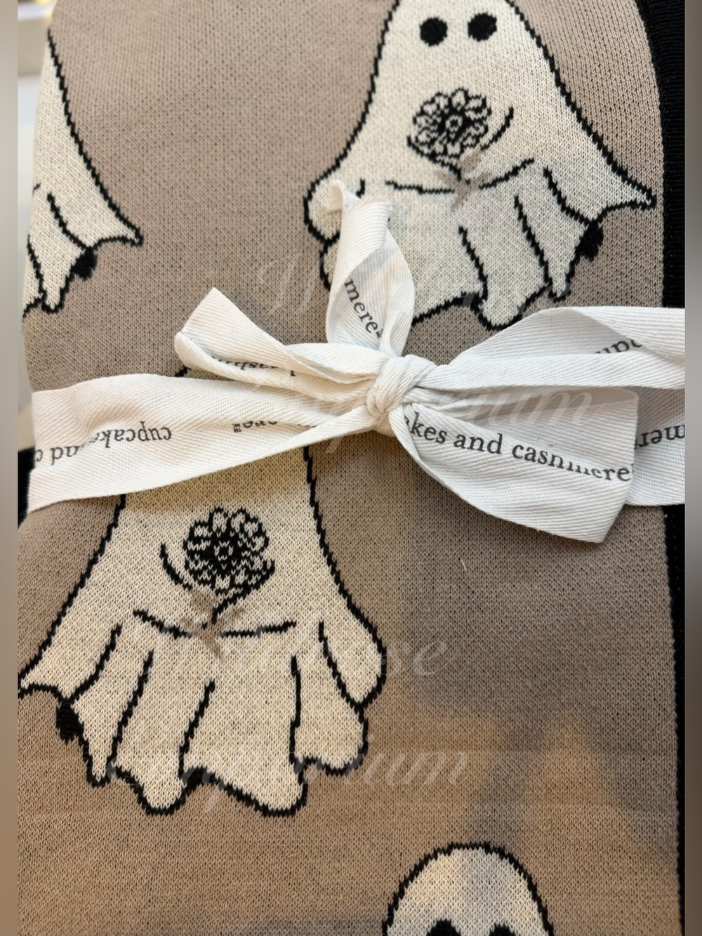 Cupcakes and Cashmere ghost holding bouquet flowers ruffled hem knit throw viral - Picture 9 of 9